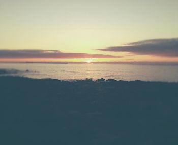 Scenic view of sea at sunset