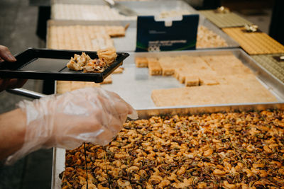 Midsection of person preparing food