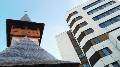 Low angle view of modern buildings against clear sky