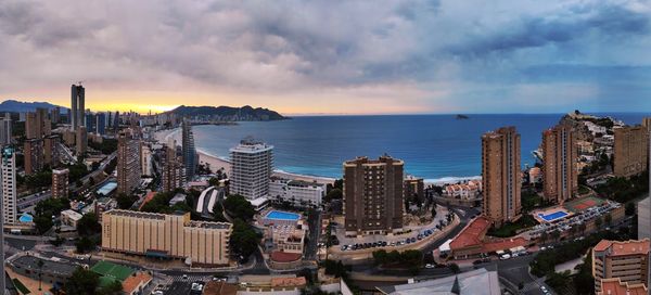 High angle view of buildings against cloudy sky benidorm