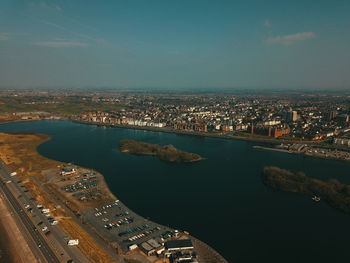 High angle view of river amidst buildings in city