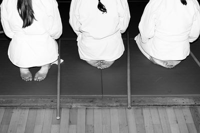 Low section of people sitting outdoors