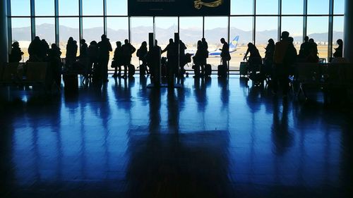 Silhouette people at airport