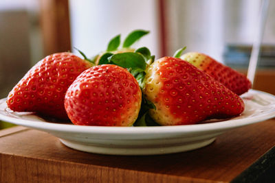 Close-up of strawberries on table