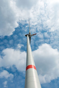 Low angle view of windmill against sky