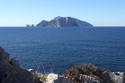 Scenic view of sea against clear sky