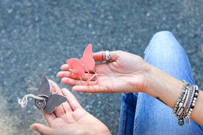 Close-up of woman holding hands