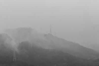 Foggy weather against sky