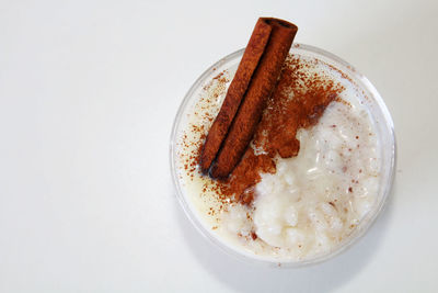 High angle view of bread in bowl against white background