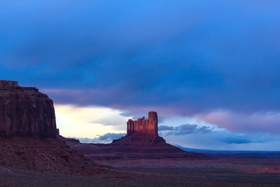 Scenic view of rock formation against sky