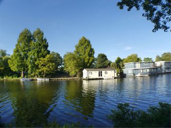 Scenic view of calm lake against clear sky