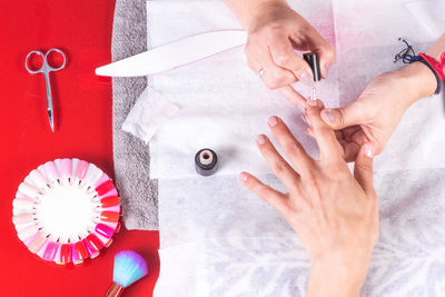 Directly above shot of woman feet on table