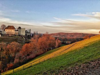 Scenic view of landscape against sky during autumn