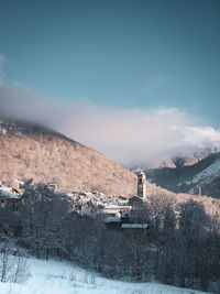 Scenic view of snowcapped mountain against sky