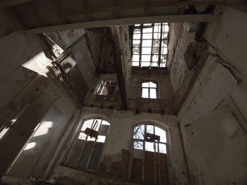 Low angle view of skylight in old building