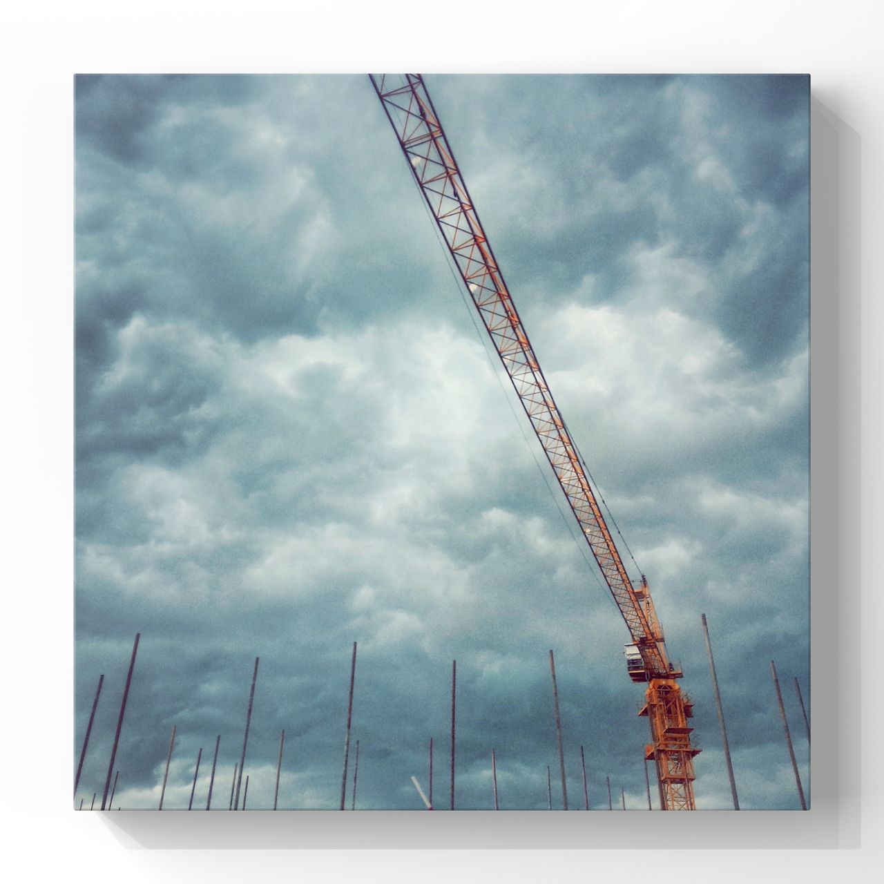 transfer print, sky, auto post production filter, cloud - sky, cloudy, low angle view, cloud, weather, overcast, built structure, water, connection, day, outdoors, nature, transportation, architecture, no people, metal, tall - high