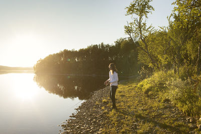 Man fishing at river