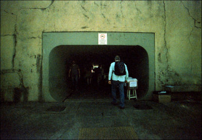 Man standing in abandoned building