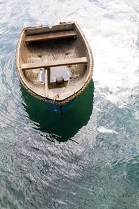 High angle view of boat moored in water