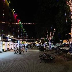 Illuminated street light at night