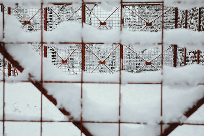 Full frame shot of snow covered railing