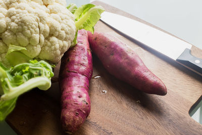 High angle view of vegetables on cutting board