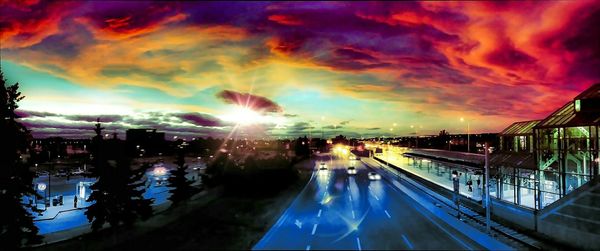 City against cloudy sky at sunset