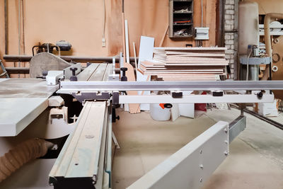 Sawing machine for woodworking. carpentry production for wood. small business. workshop 