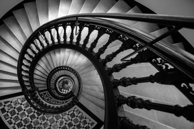 Directly below shot of spiral staircase in building