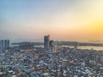 High angle view of cityscape during sunset