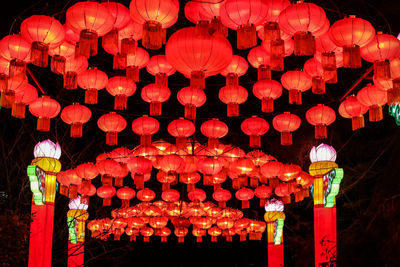 Illuminated lanterns hanging at night