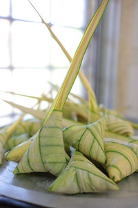 Close-up of green fruits on table