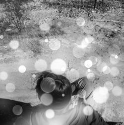 High angle view of girl swimming in water