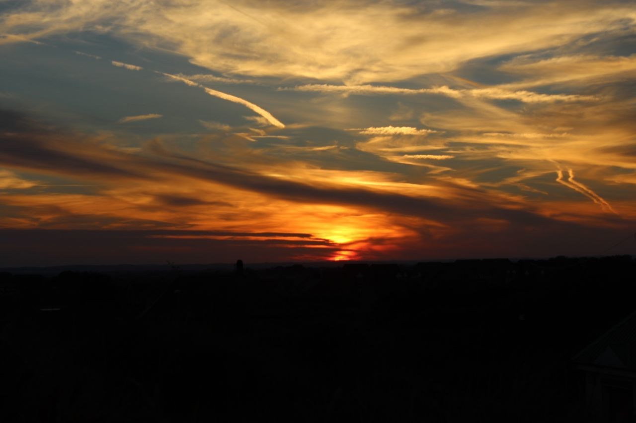 sunset, silhouette, orange color, sky, scenics, beauty in nature, tranquil scene, tranquility, cloud - sky, idyllic, nature, cloud, dramatic sky, landscape, sun, dark, outdoors, moody sky, no people, outline