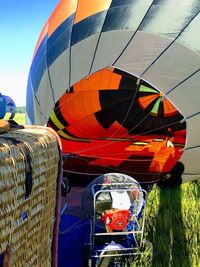 View of hot air balloon on field