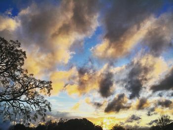 Low angle view of dramatic sky during sunset