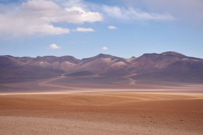 Scenic view of desert against sky