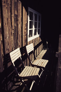 Sunlight falling on wooden wall