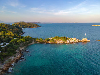 The top view of beautiful blue seashore and rocky on coast