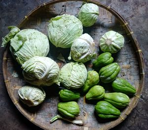 High angle view of vegetables in basket on table