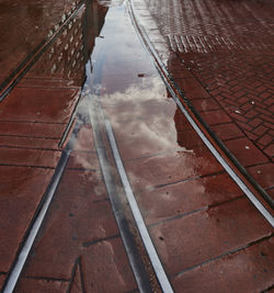 High angle view of wet street in city