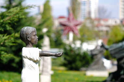 Close-up of angel statue in park