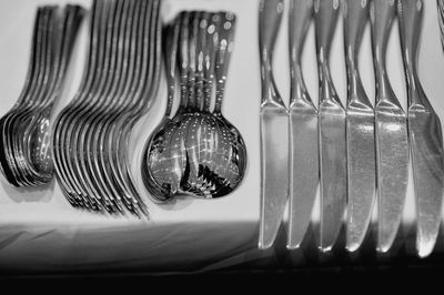 High angle view of cutlery arranged on table