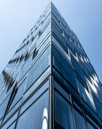 Low angle view of modern building against clear sky