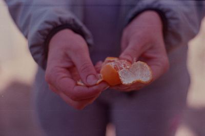 Low section of woman holding ice cream