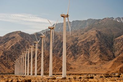 Wind turbine against sky