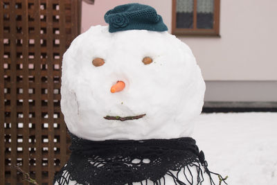 Close-up of hat on snow during winter