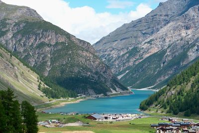 Panoramic view of lake and buildings against sky