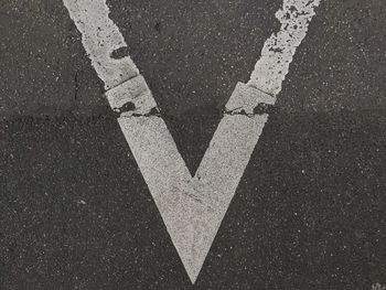 High angle view of white marking on road