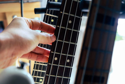 Hand playing guitar